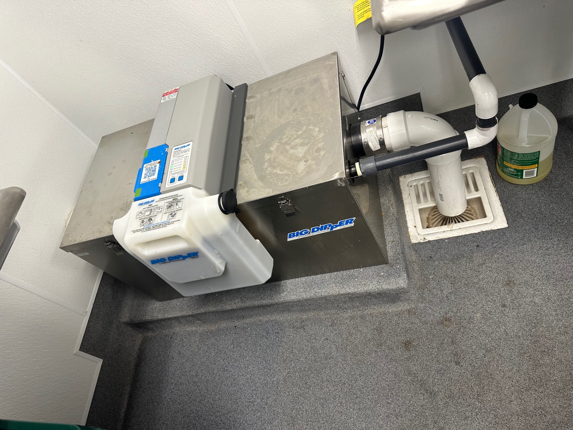 Small indoor grease trap serving a commercial kitchen in Norco, California