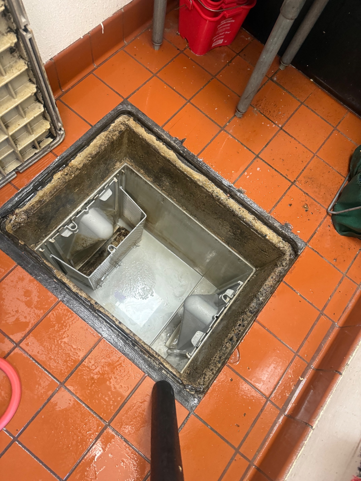 Small indoor grease trap serving a commercial kitchen in Beaumont, California