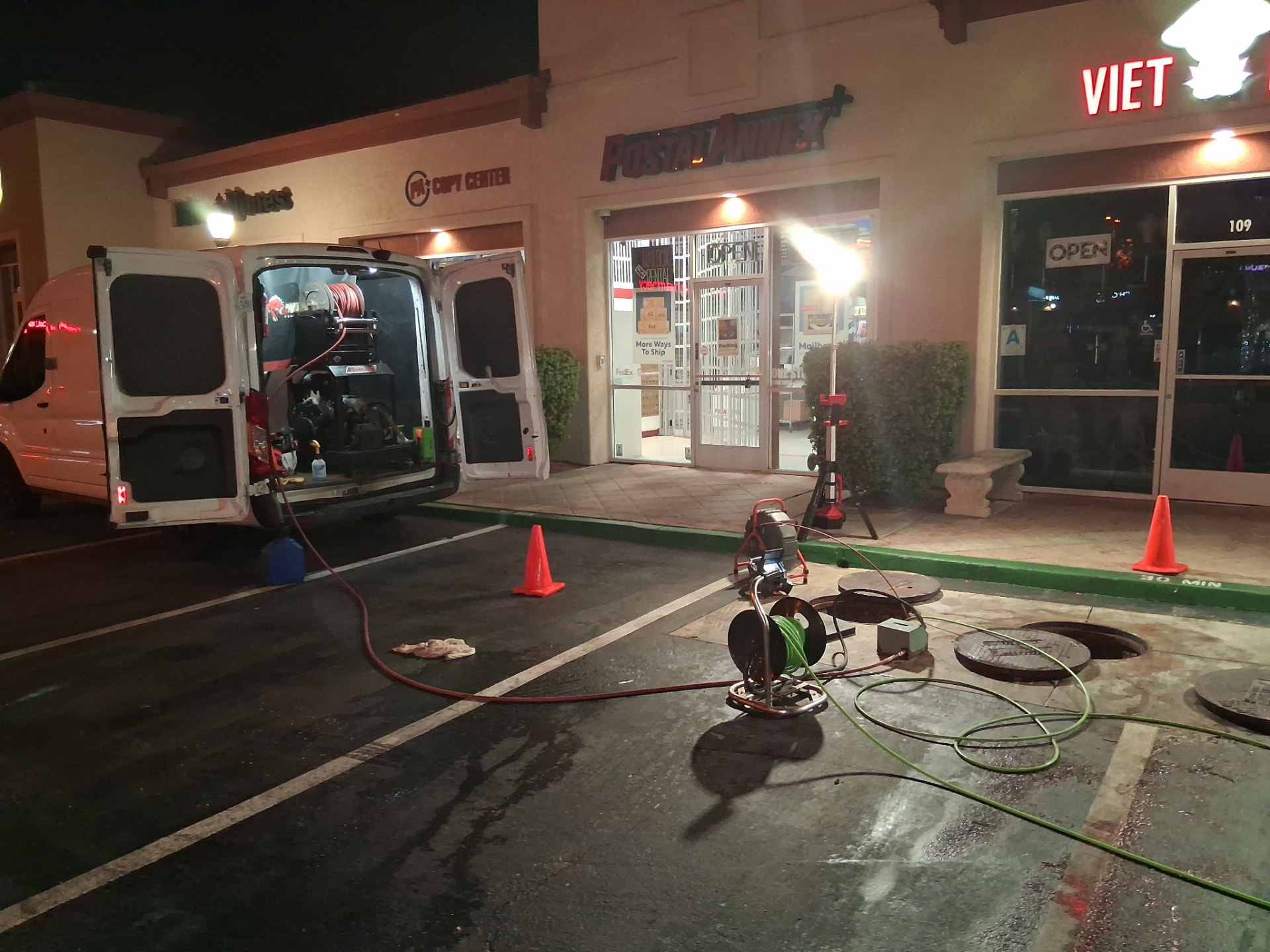 Service van and hose reel set up for grease line jetting at a restaurant in Blythe, California