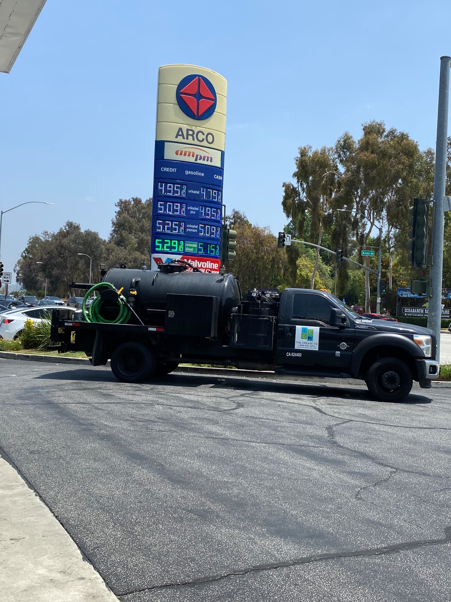 Cooking oil collection truck on a scheduled route in Palm Desert, California