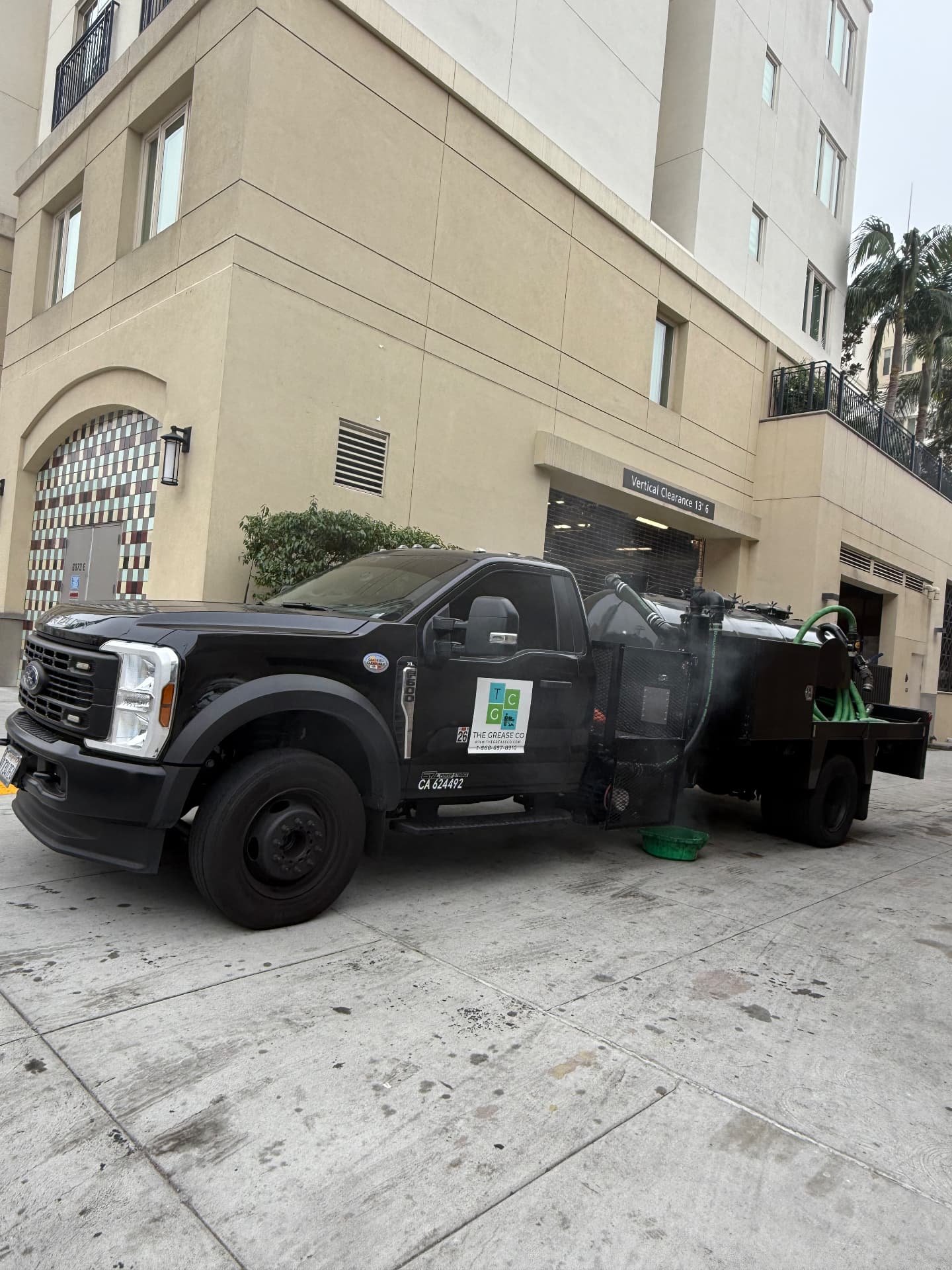 The Grease Company vacuum truck on site for interceptor pumping