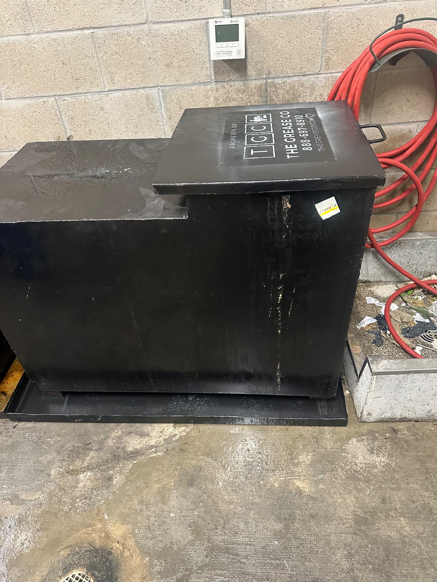 Outdoor restaurant cooking oil storage tank in a clean service area in Murrieta, California